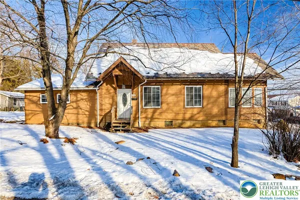 a backyard of a house with seating space