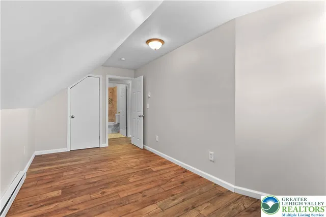 a bathroom with a bathtub and shower