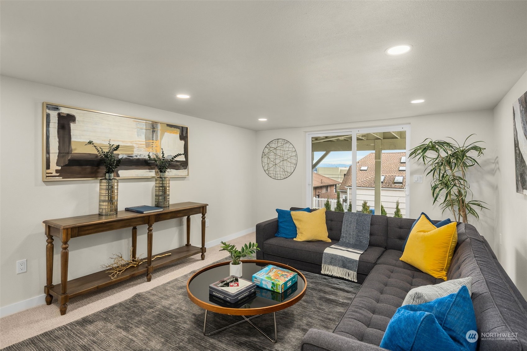 3054 37th Avenue Southwest Seattle, WA 98126 - Photo 25 of 38 a living room with furniture and a wooden floor