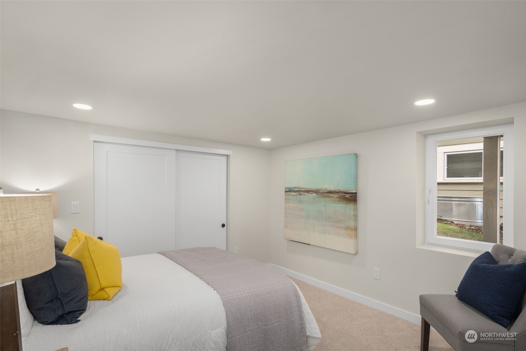 3054 37th Avenue Southwest Seattle, WA 98126 - Photo 27 of 38 a bedroom with a bed and window