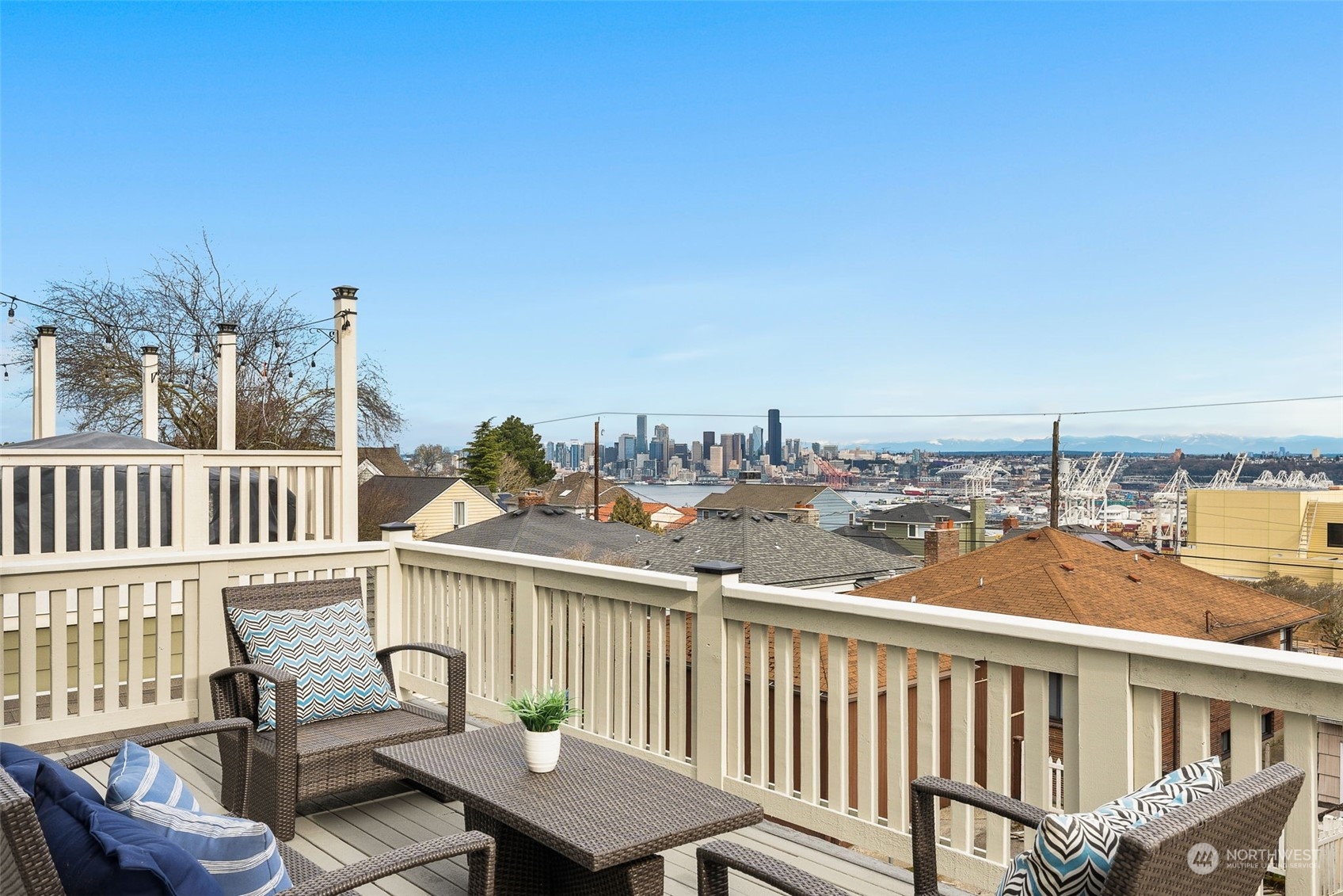 3054 37th Avenue Southwest Seattle, WA 98126 - Photo 32 of 38 a view of a balcony with two chairs and a table