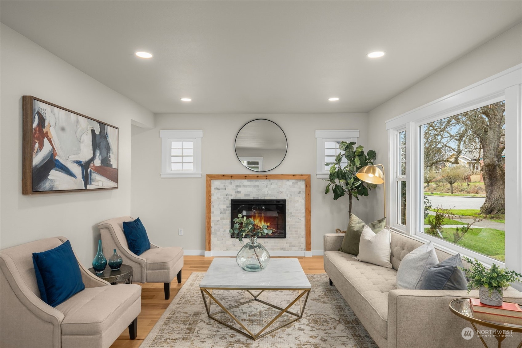 3054 37th Avenue Southwest Seattle, WA 98126 - Photo 4 of 38 a living room with furniture and a fireplace