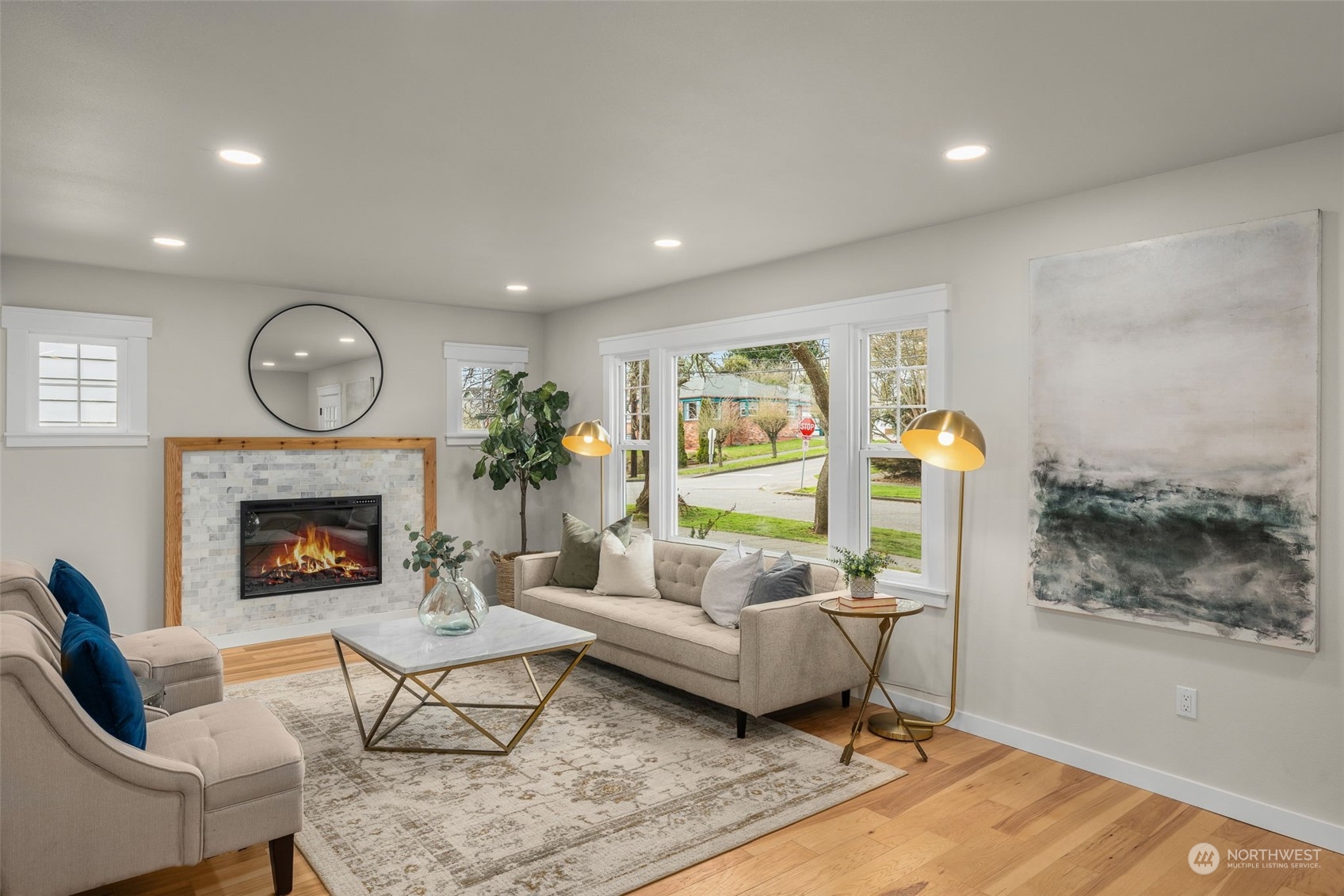 3054 37th Avenue Southwest Seattle, WA 98126 - Photo 5 of 38 a living room with furniture and a fireplace