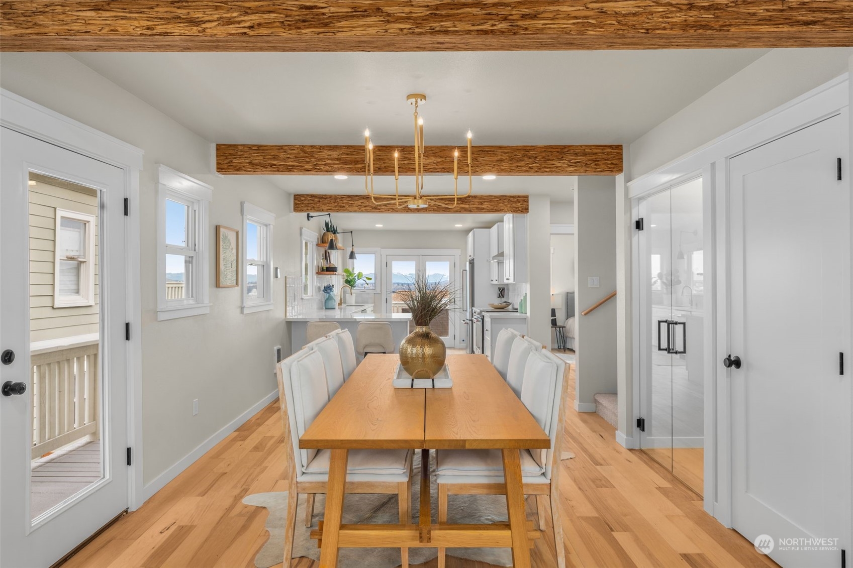 3054 37th Avenue Southwest Seattle, WA 98126 - Photo 7 of 38 a dining room with a table and chairs