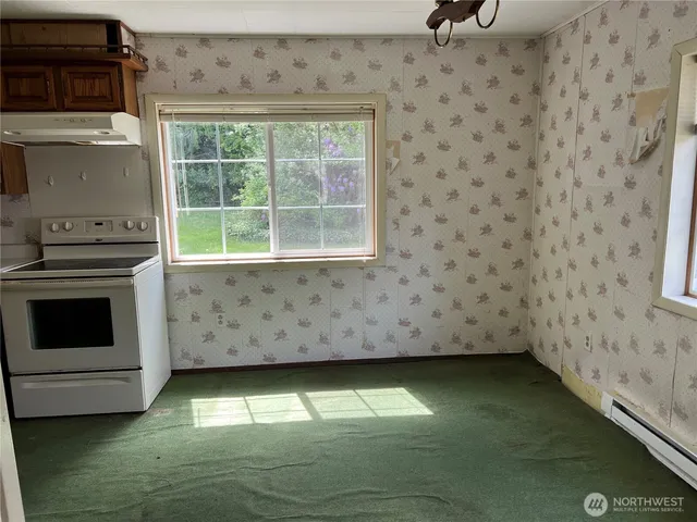 a view of a room with an empty space