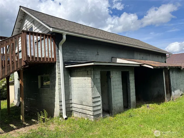 a front view of a house with a garage
