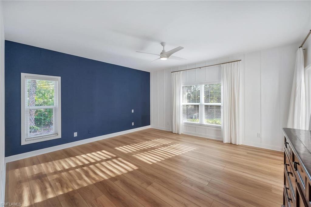 3110 70th Street Southwest Naples, FL 34105 - Photo 23 of 47 a view of an empty room with a window