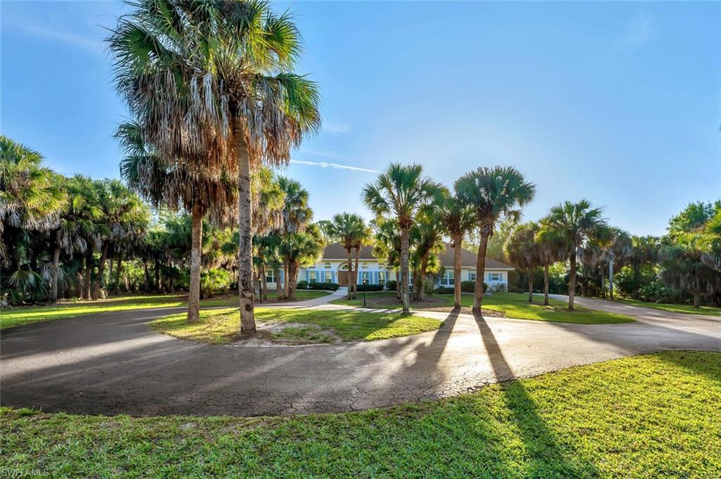 3110 70th Street Southwest Naples, FL 34105 - Photo 3 of 47 a view of a park with palm trees