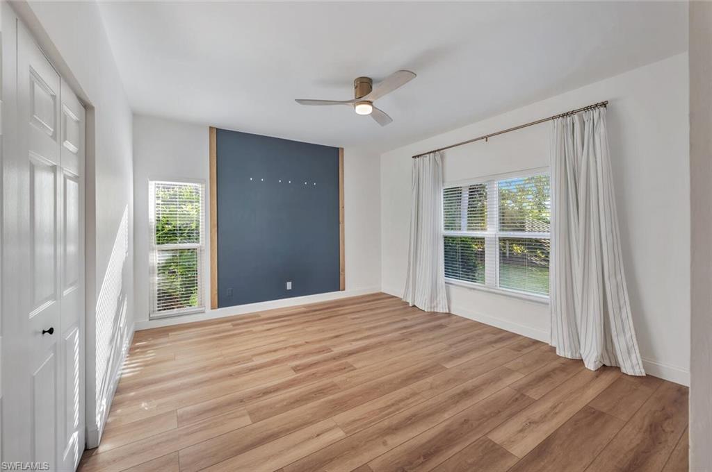 3110 70th Street Southwest Naples, FL 34105 - Photo 31 of 47 a view of an empty room with a window