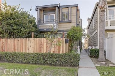 212 Rochester Avenue Huntington Beach, CA 92648 - Photo 1 of 10 Front fenced downstairs patio unit