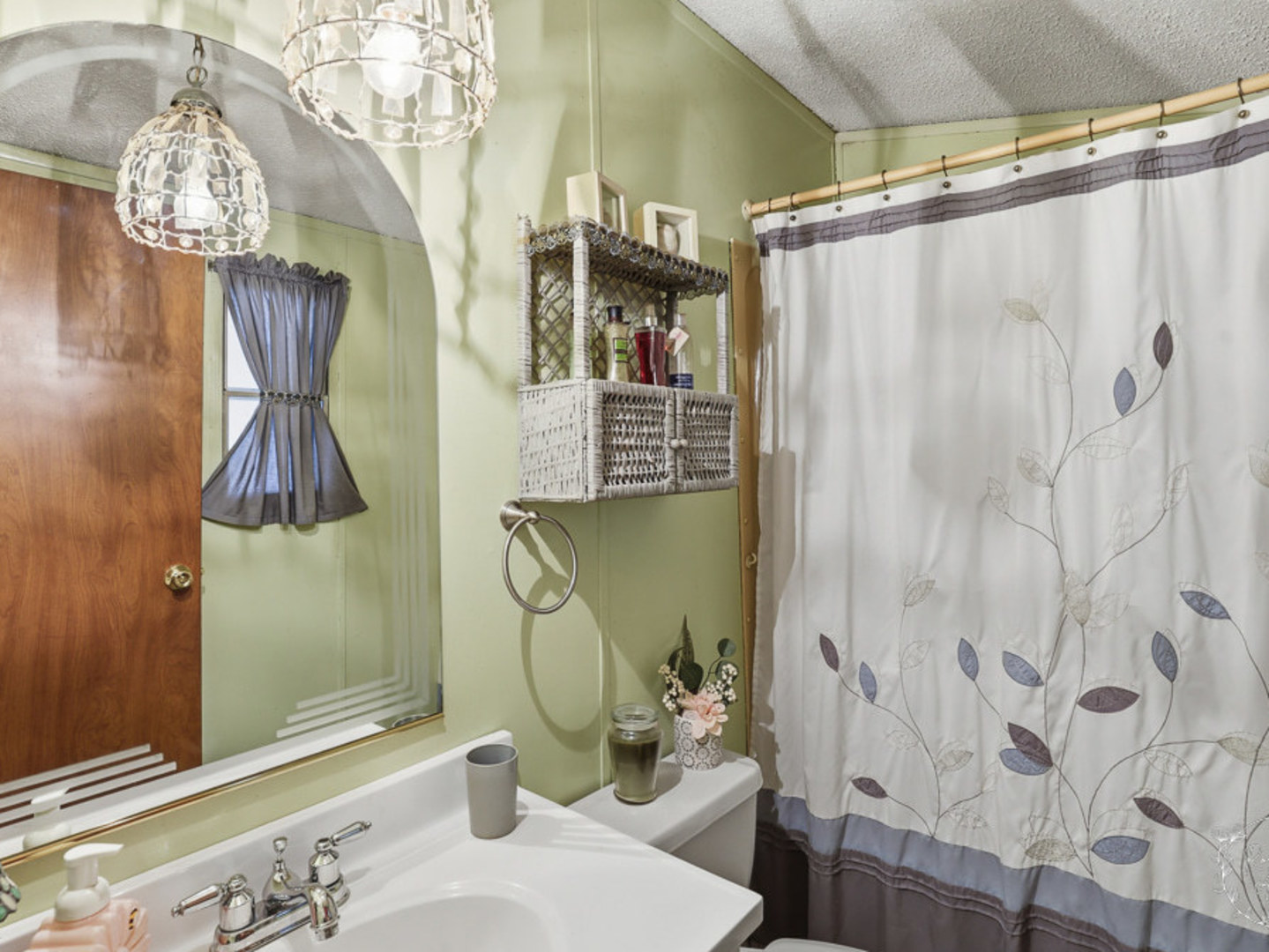 52 Partridge Lane Beecher, IL 60401 - Photo 13 of 24 a bathroom with a sink a mirror and a shower