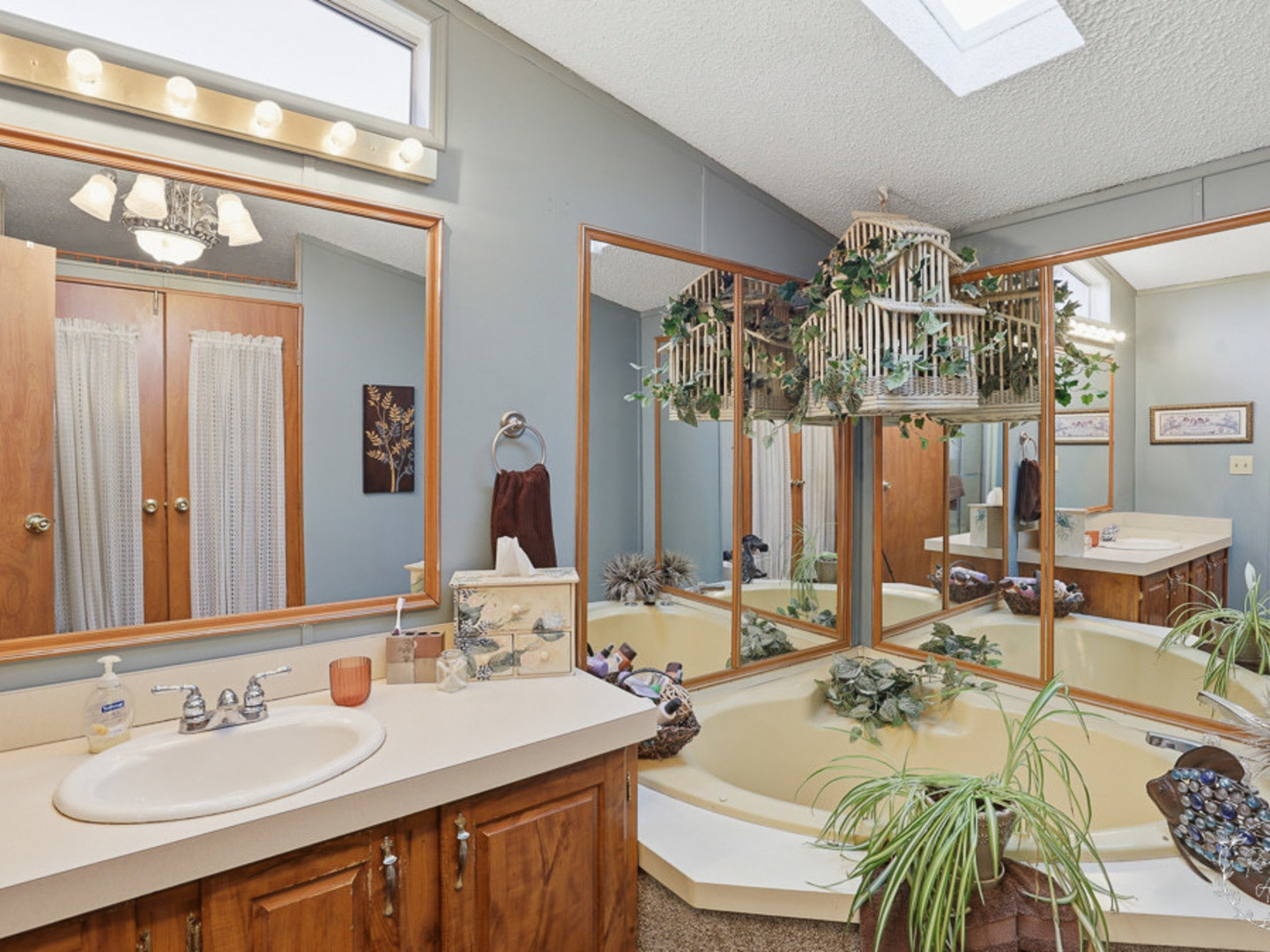 52 Partridge Lane Beecher, IL 60401 - Photo 18 of 24 a en suite bathroom with sink mirror and bathtub
