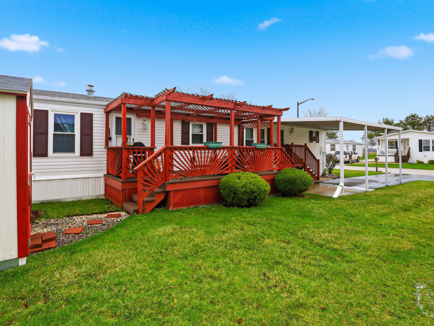 52 Partridge Lane Beecher, IL 60401 - Photo 22 of 24 a front view of a house with garden