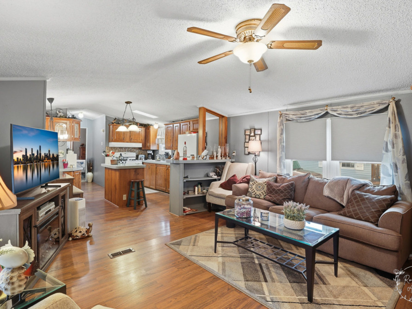 52 Partridge Lane Beecher, IL 60401 - Photo 3 of 24 a living room with furniture and kitchen view