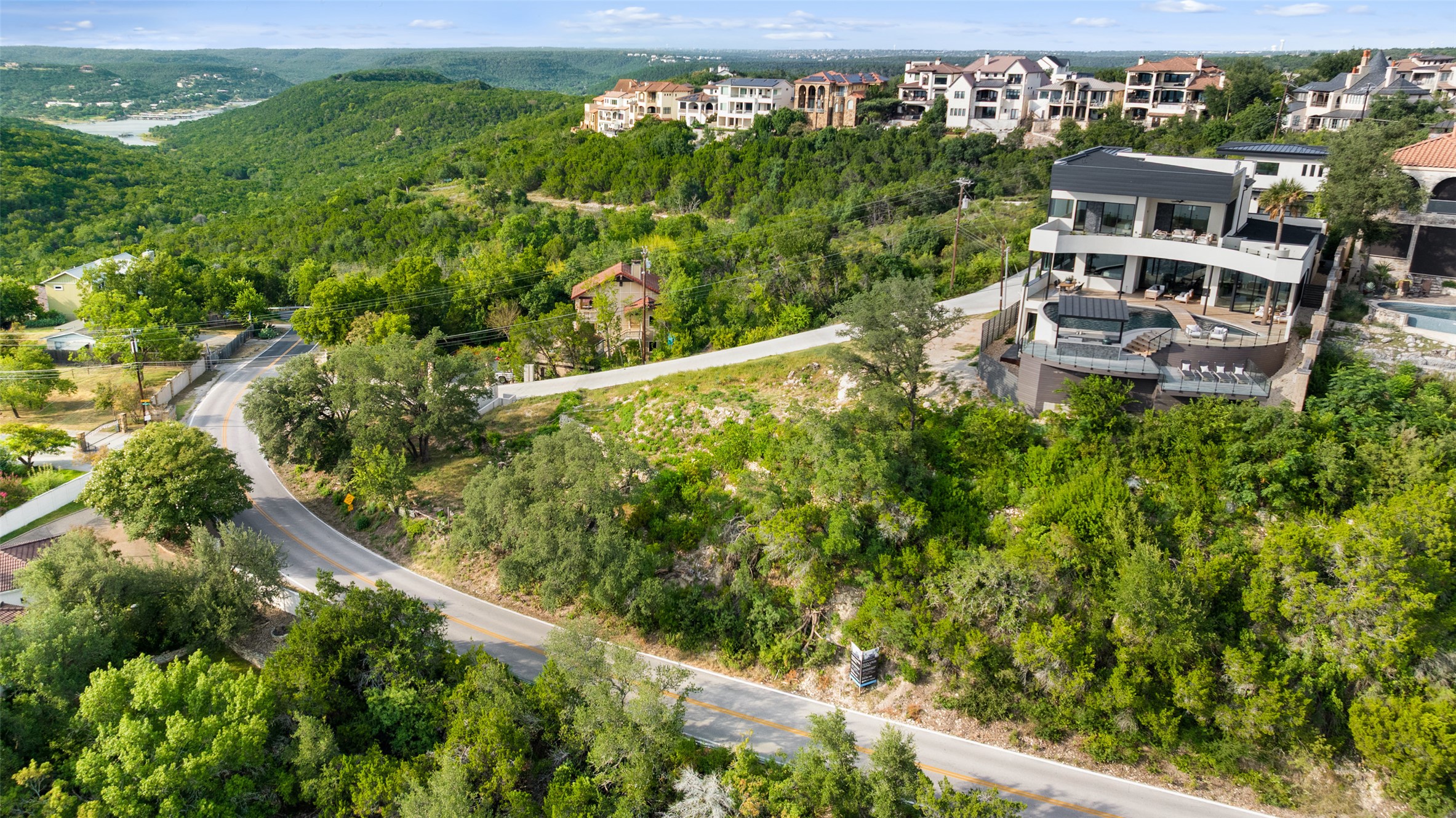 6813 Oasis Pass Austin, TX 78732 - Photo 11 of 36 a balcony with table and chairs