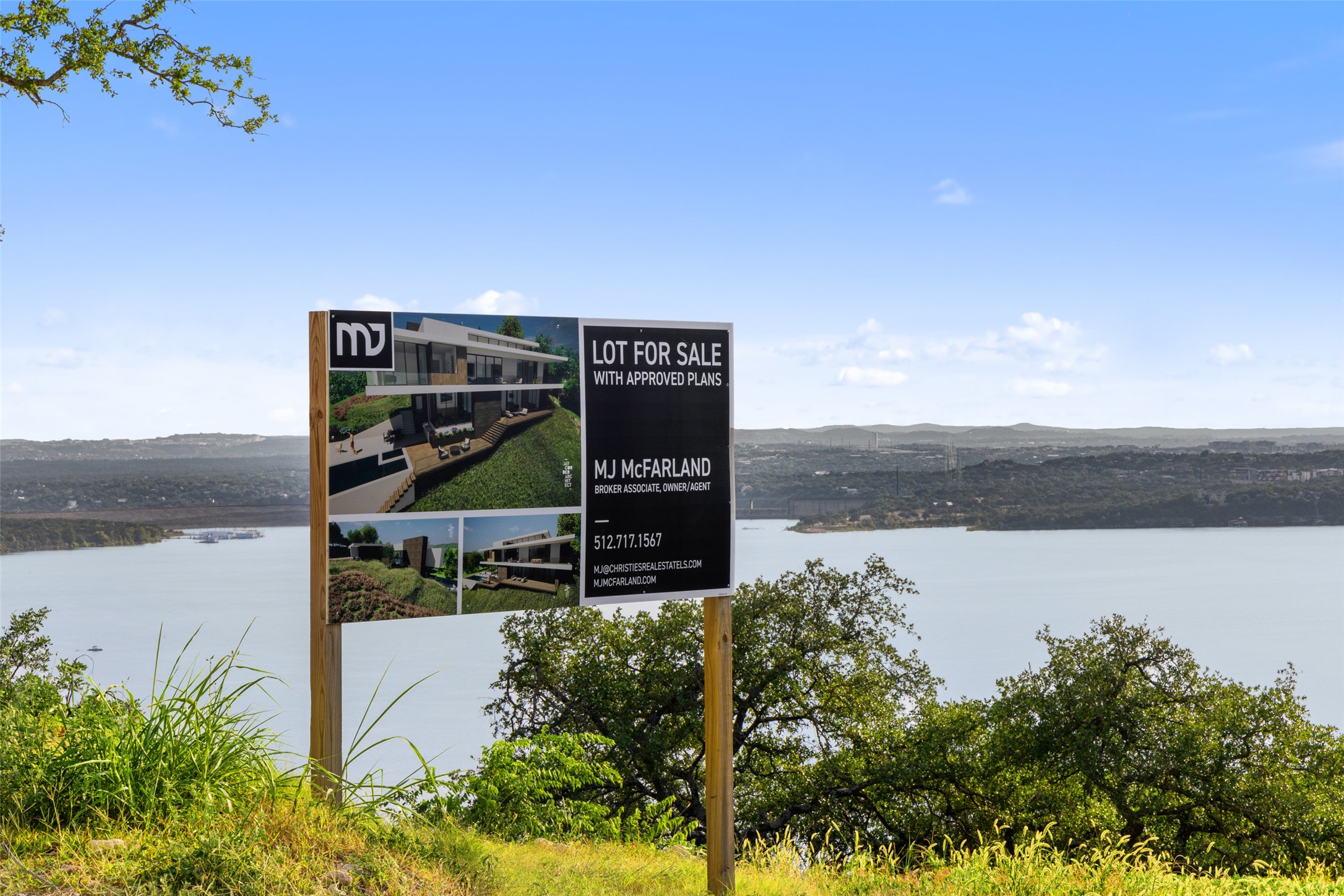 6813 Oasis Pass Austin, TX 78732 - Photo 26 of 36 a view of a lake with a big yard