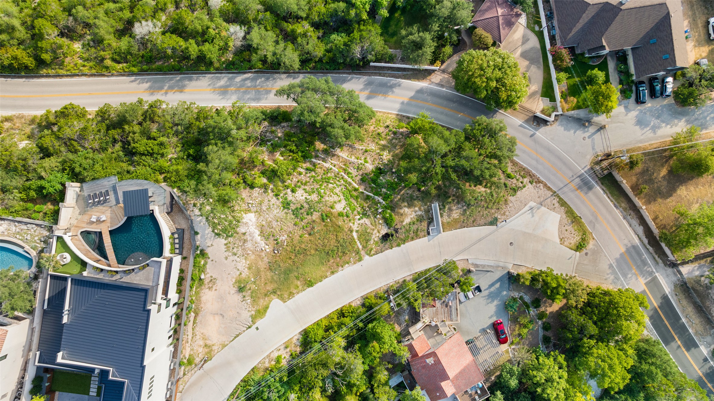 6813 Oasis Pass Austin, TX 78732 - Photo 4 of 36 an aerial view of a house with a swimming pool
