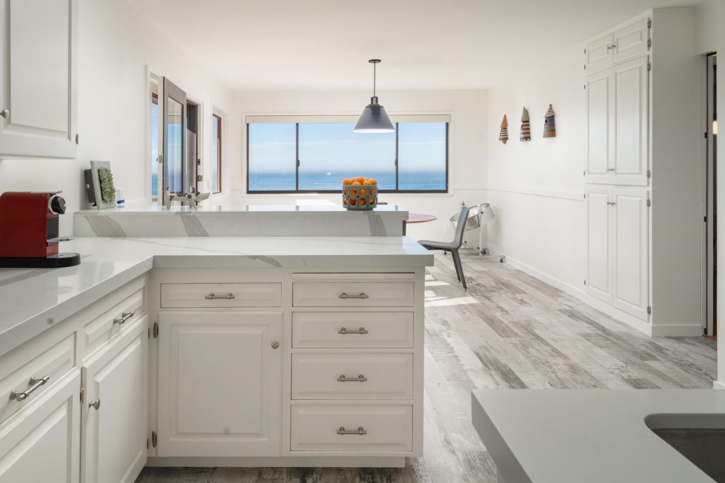 2715 Ribera Road Carmel, CA 93923 - Photo 15 of 41 a kitchen with cabinets appliances and a counter space