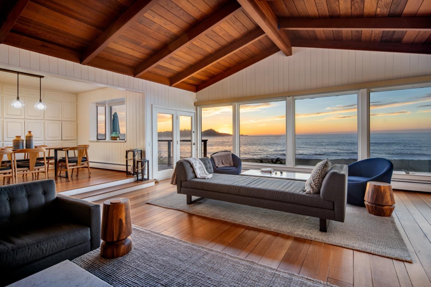 2715 Ribera Road Carmel, CA 93923 - Photo 2 of 41 a living room with furniture and floor to ceiling windows