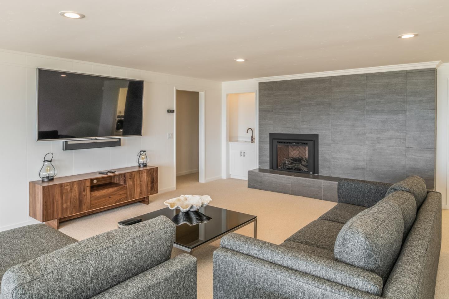 2715 Ribera Road Carmel, CA 93923 - Photo 23 of 41 a living room with furniture and a flat screen tv