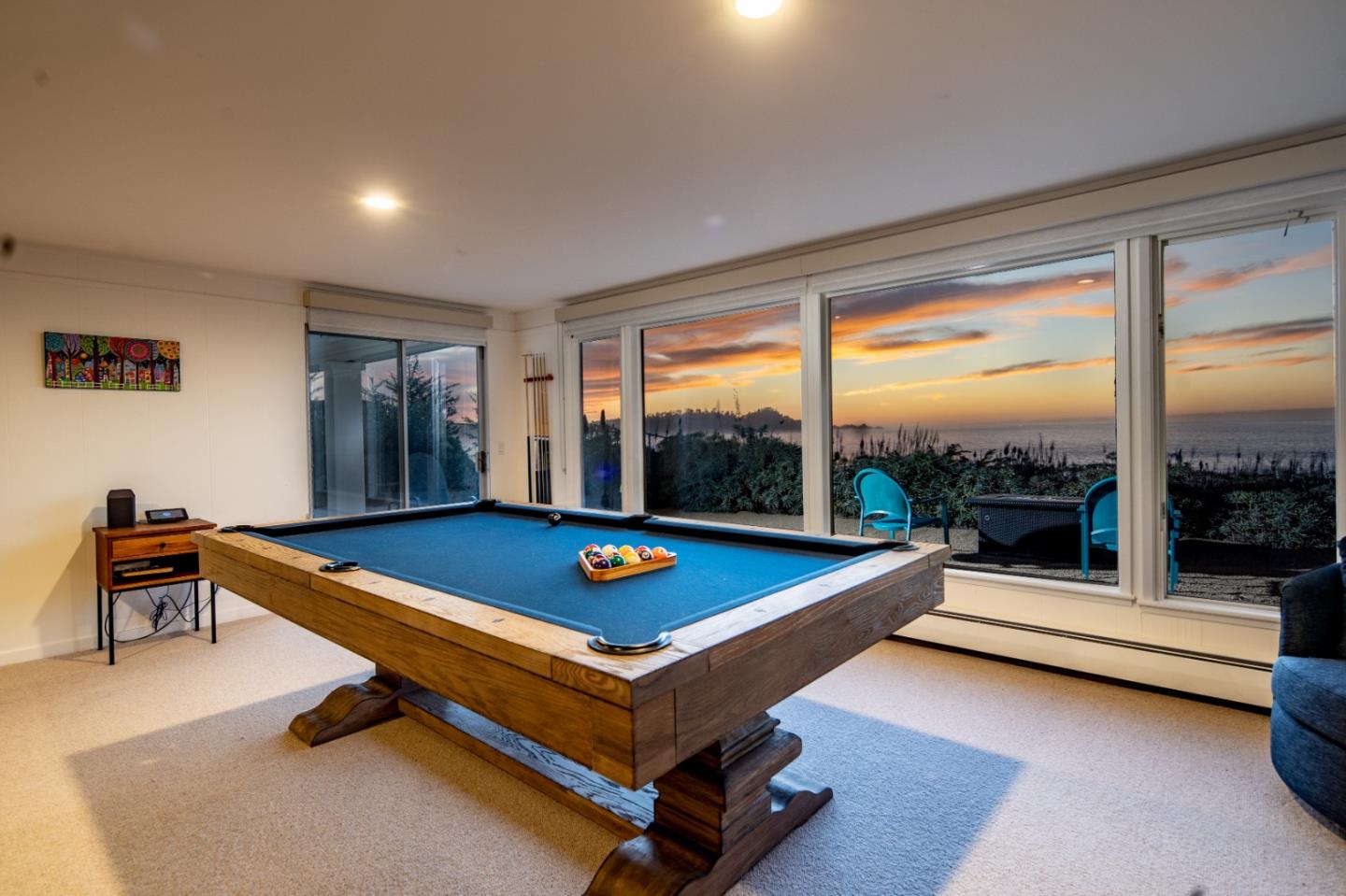 2715 Ribera Road Carmel, CA 93923 - Photo 25 of 41 a living room with pool table and floor to ceiling window