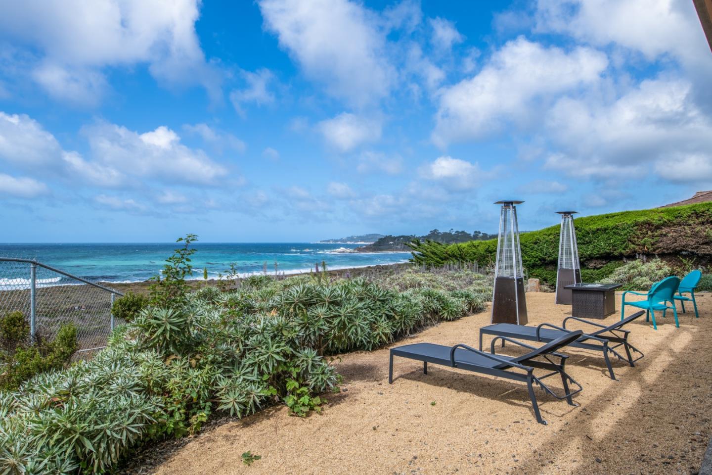 2715 Ribera Road Carmel, CA 93923 - Photo 35 of 41 a view of a garden with chairs