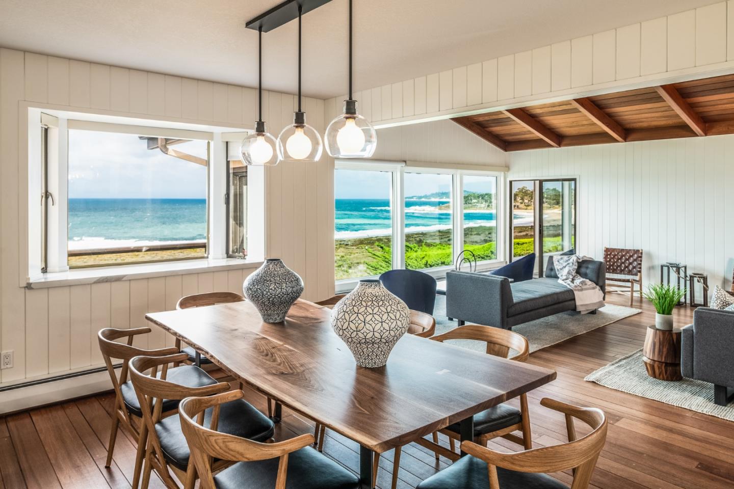 2715 Ribera Road Carmel, CA 93923 - Photo 5 of 41 a view of a dining room with furniture wooden floor and chandelier