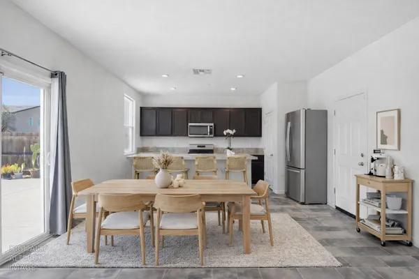 a view of a dining room with furniture