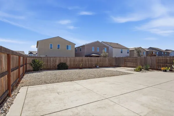 a house view with a garden space