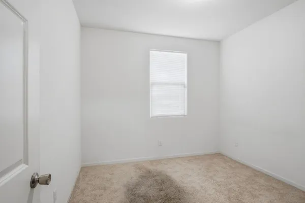an empty room with a window