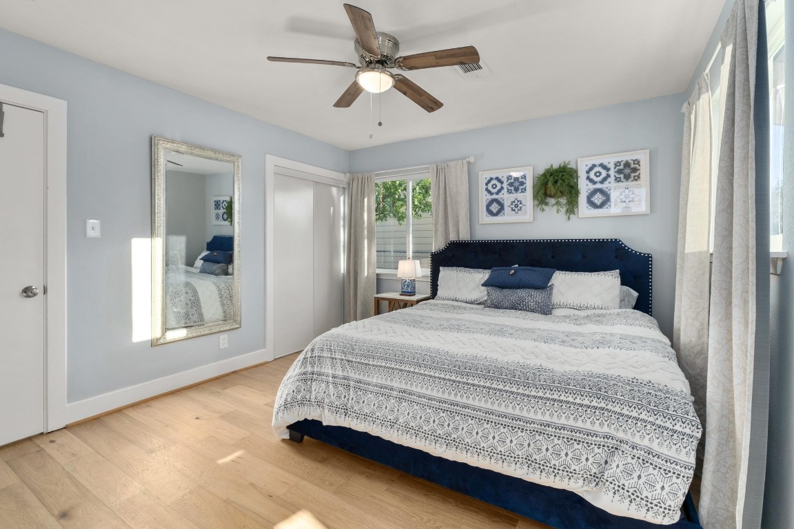 5307 Halmark Drive Austin, TX 78723 - Photo 16 of 31 a bedroom with a bed and a window