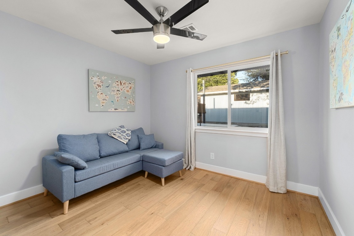 5307 Halmark Drive Austin, TX 78723 - Photo 20 of 31 a living room with furniture and a window
