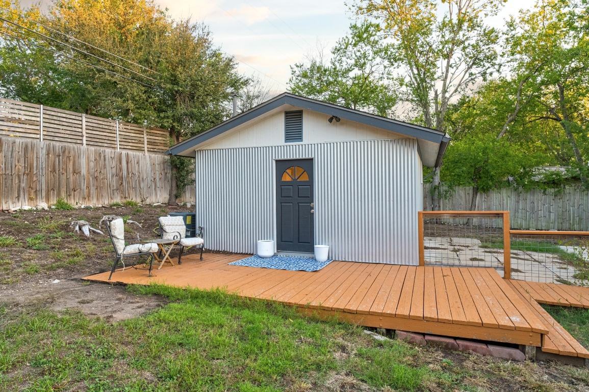 5307 Halmark Drive Austin, TX 78723 - Photo 22 of 31 a view of backyard with small cabin