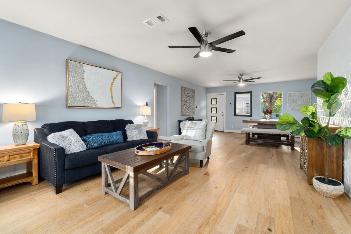 5307 Halmark Drive Austin, TX 78723 - Photo 3 of 31 a living room with furniture and a wooden floor