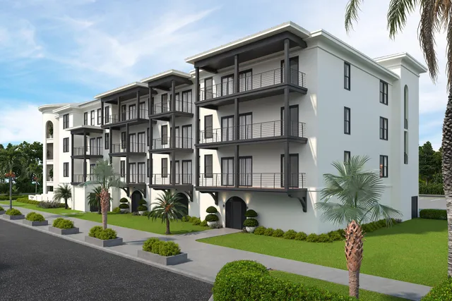 a front view of building with yard