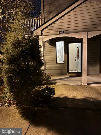 a front view of house with yard