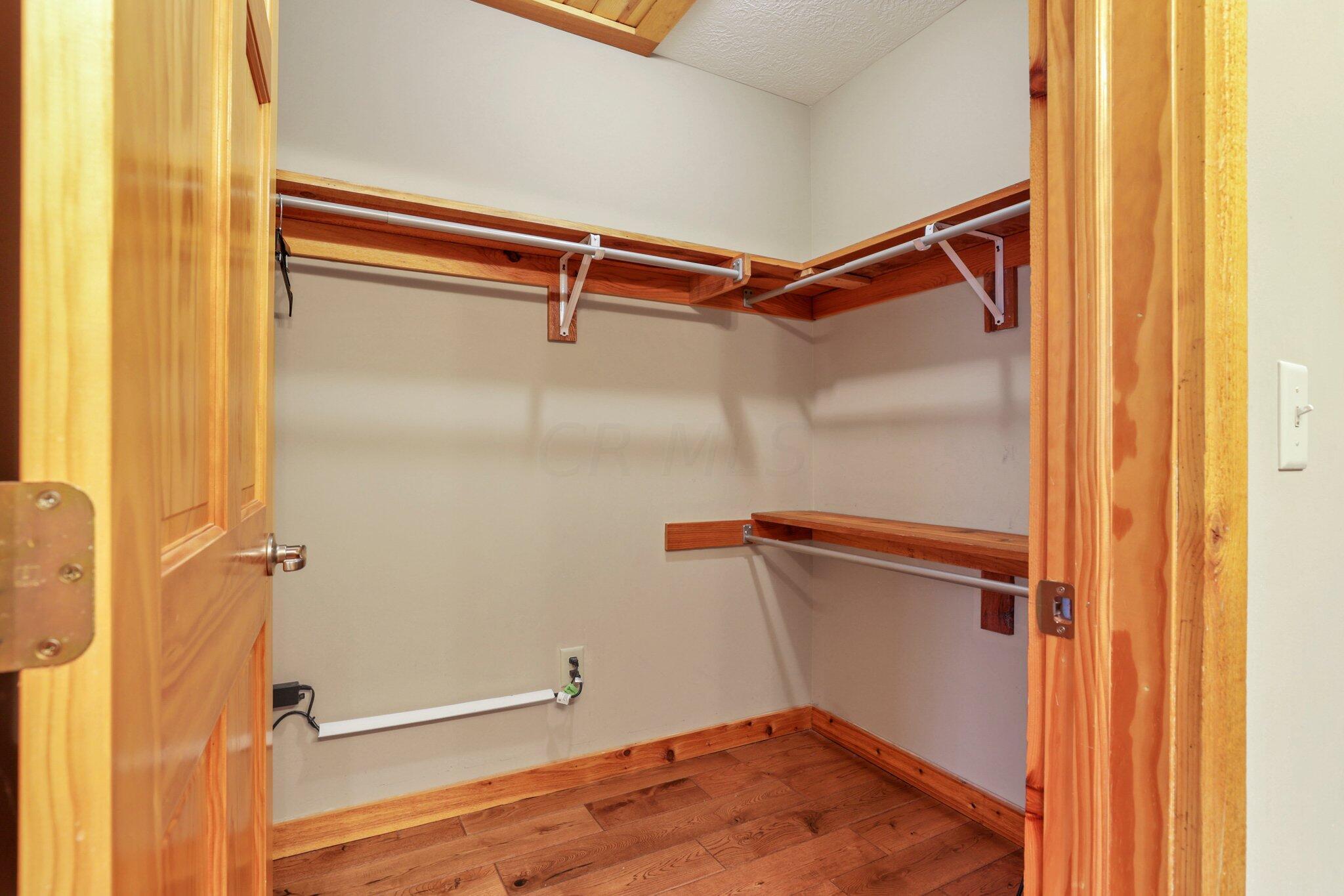 18397 Goat Run Honey Fork Road Logan, OH 43138 - Photo 29 of 65 Main Floor Primary Walk-in Closet