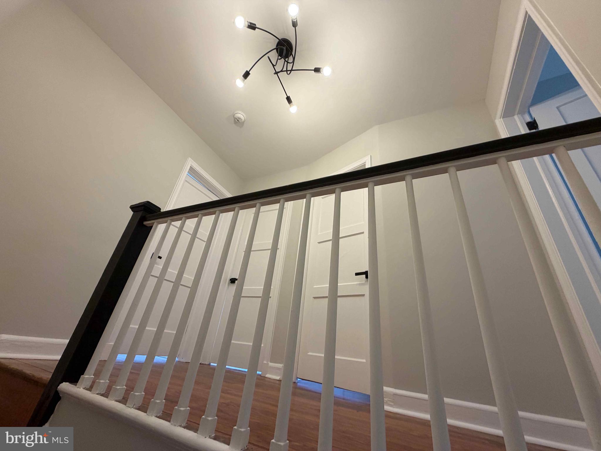 1535 East Cold Spring Lane Baltimore, MD 21218 - Photo 17 of 24 a view of staircase with rug