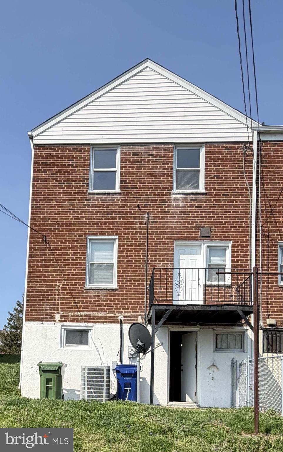 1535 East Cold Spring Lane Baltimore, MD 21218 - Photo 24 of 24 a front view of a house with garden