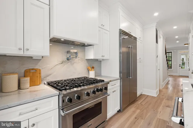 a workspace with furniture and wooden floor