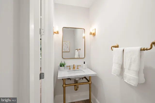 a bedroom with a bed and a lamp