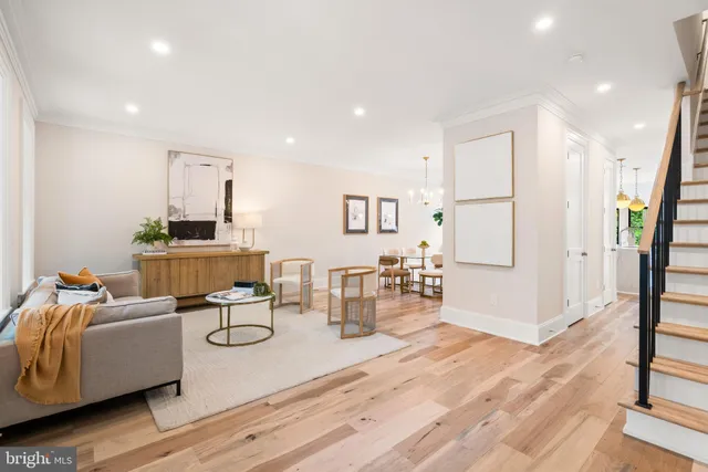 a living room with furniture and window