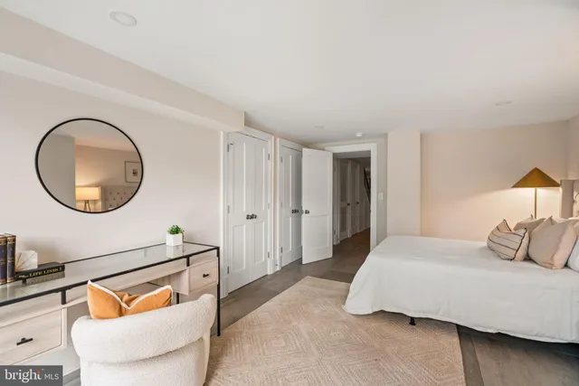 a view of outdoor sitting area with furniture and wooden fence