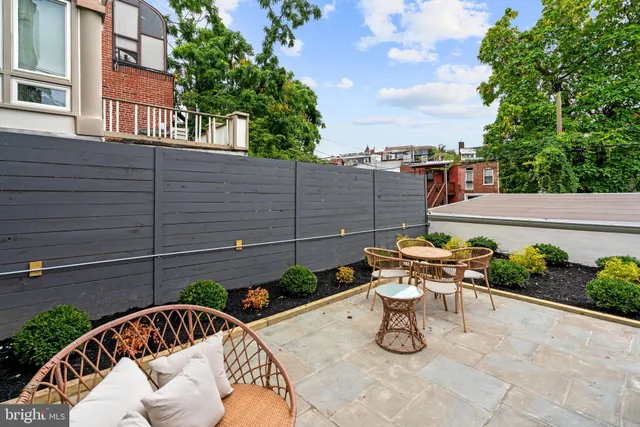 a view of a building with a street