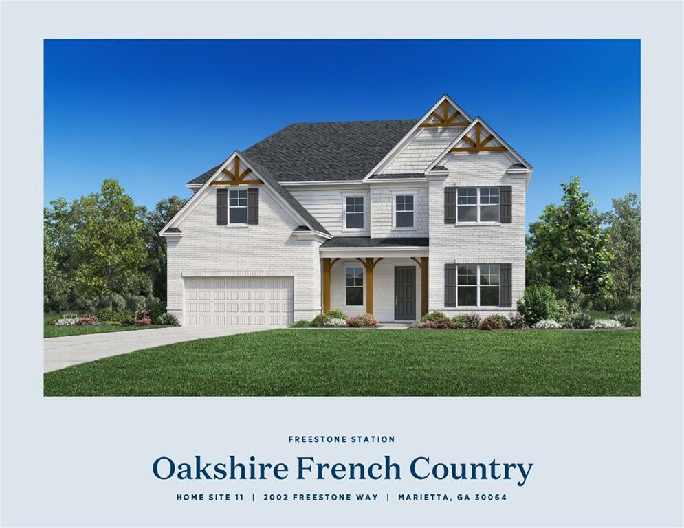 a view of a white house with a yard