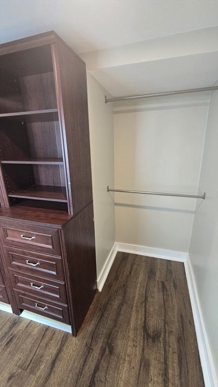 15 Central Street, Unit 4 Georgetown, MA 01833 - Photo 7 of 24 a view of walk in closet with wooden floor