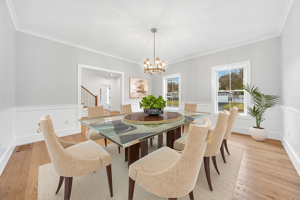 29 Irving Road Natick, MA 01760 - Photo 13 of 42 a view of a dining room with furniture window and wooden floor