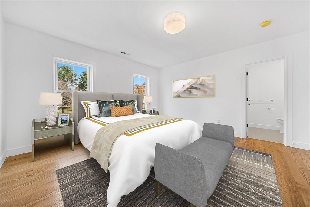 29 Irving Road Natick, MA 01760 - Photo 23 of 42 a bedroom with bed and a couch