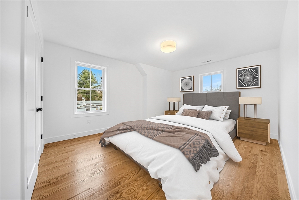 29 Irving Road Natick, MA 01760 - Photo 29 of 42 a bedroom with a bed and a window