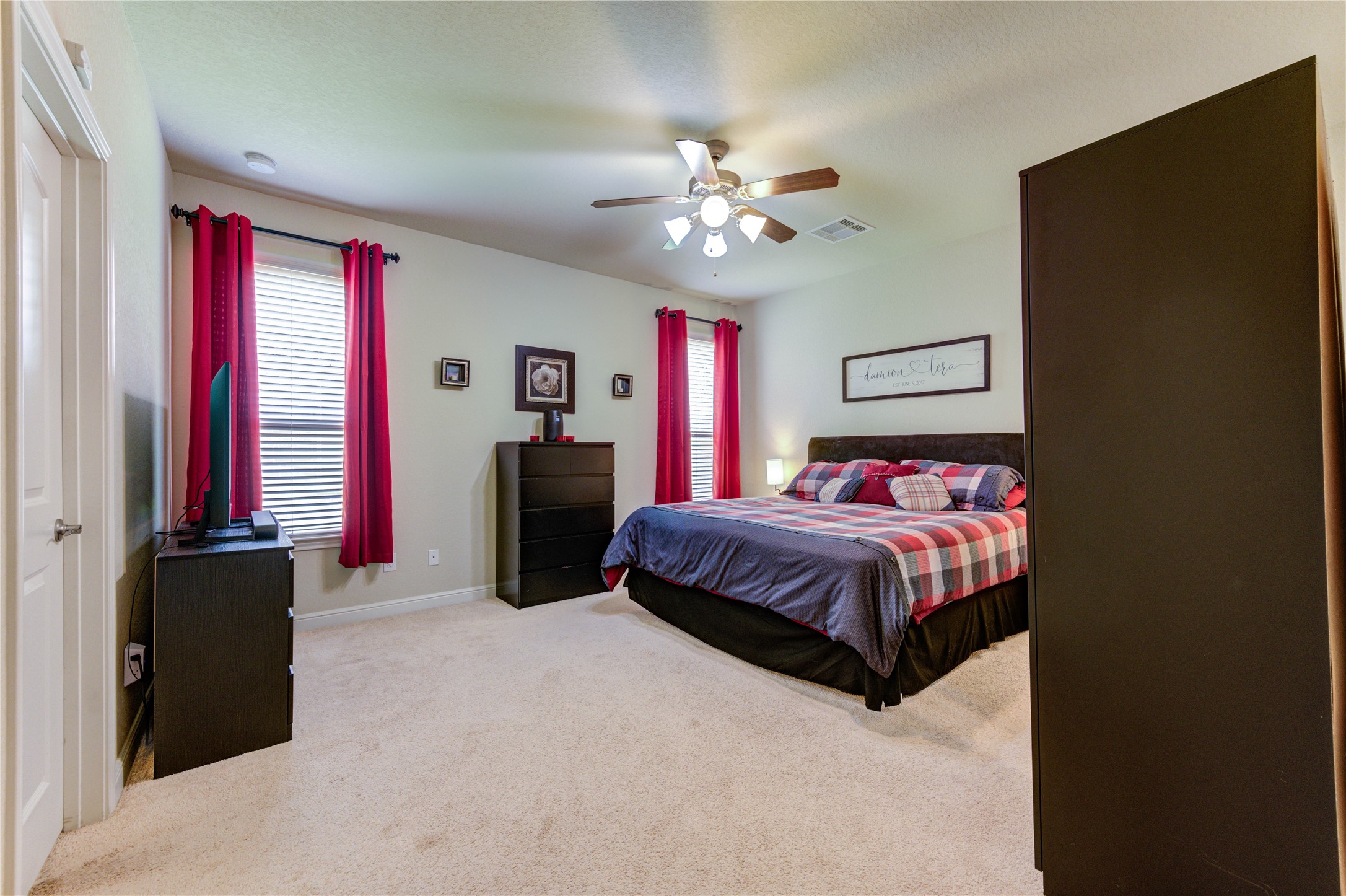 24511 Stratton Creek Drive Spring, TX 77373 - Photo 16 of 27 This generously sized primary suite easily accommodates large furnishings while maintaining an open, airy feel.